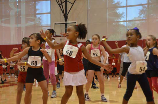 Two young dancers are lined up to audition for...